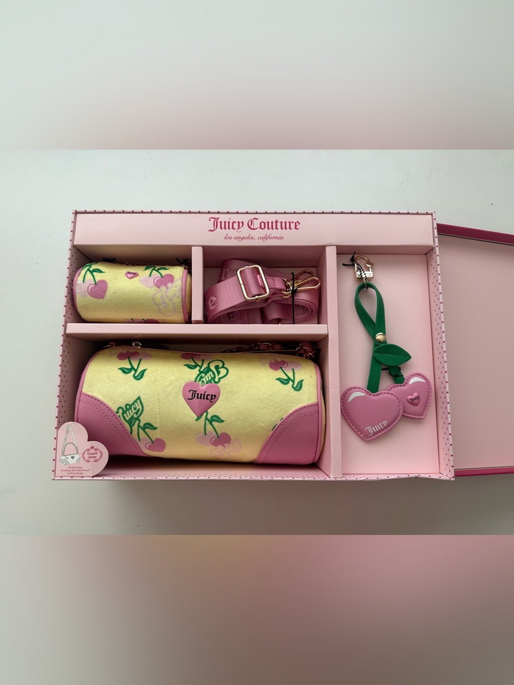 Juicy Couture Pink & Yellow Heart-Print Cylinder Bag with Green Strap Charm